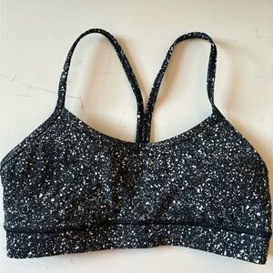 Lululemon black and white speckled Flow Y bra size 4